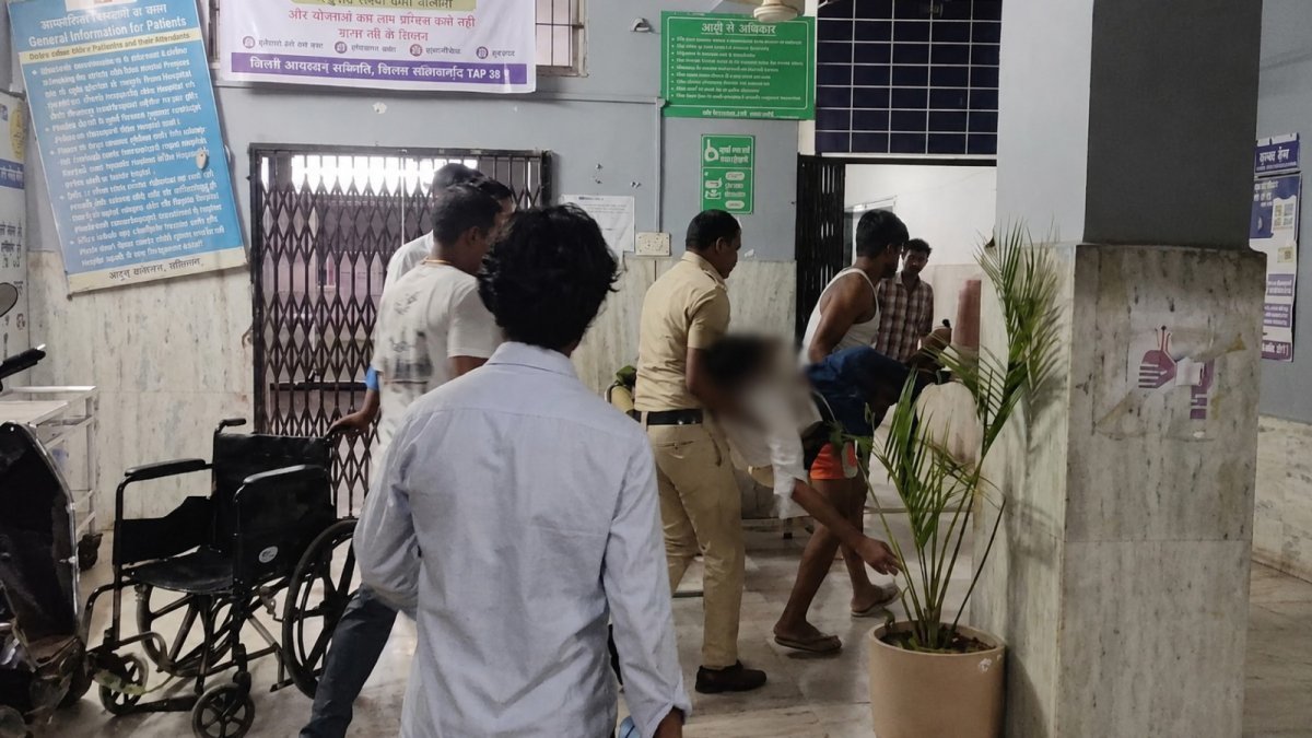 Police team taking the young man to the hospital