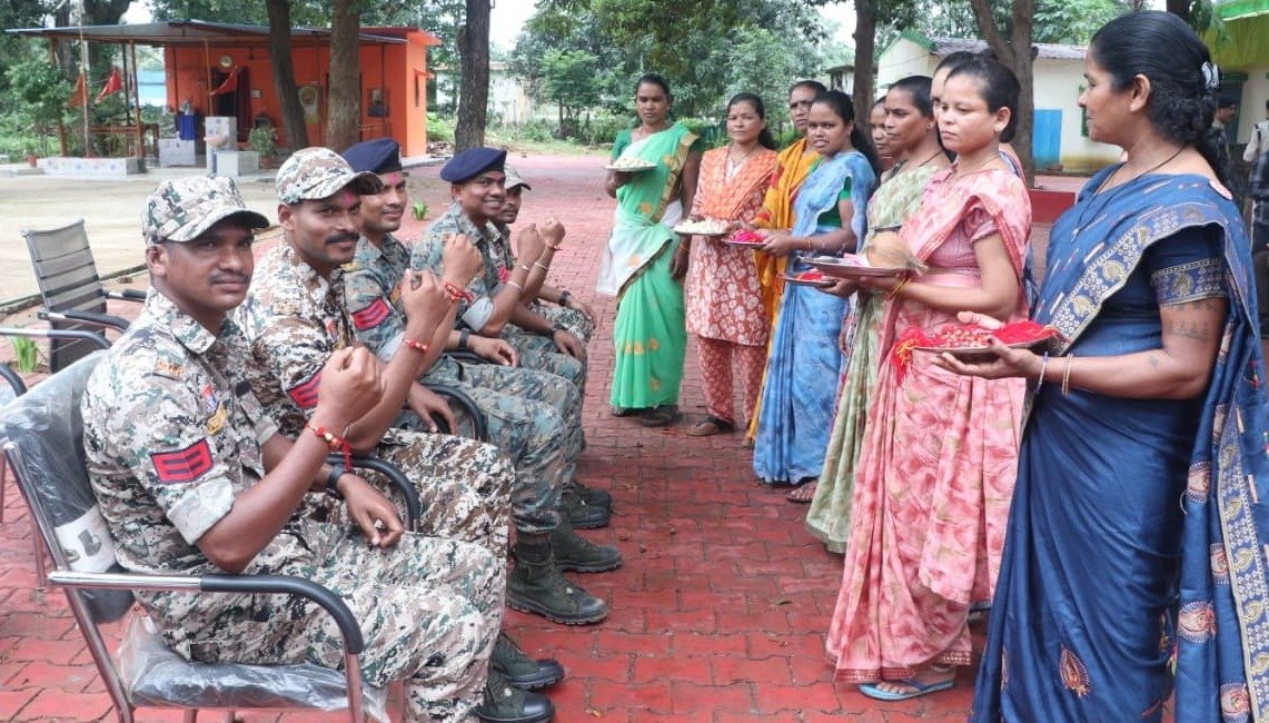 Surrendered Maoists tied Rakhis to security personnel in Bhanupratappur.