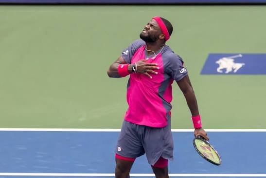 Frances Tiafoe celebrating after the victory