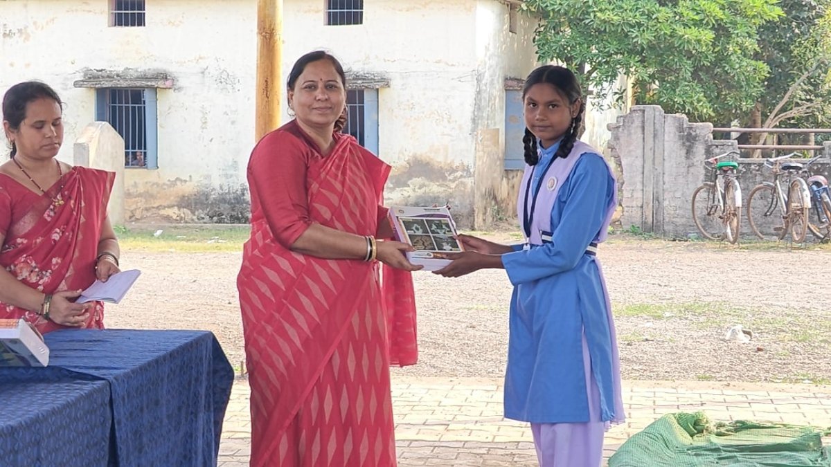 Students receive educational materials (Image Source: Keertiman Media)