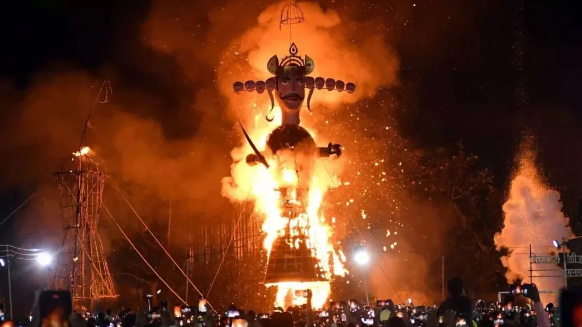 Preparations for the burning of a 30-foot cockroach effigy (Image Source: social media)